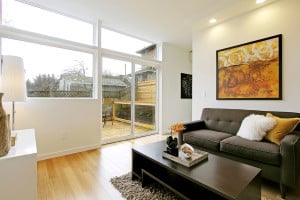 staged family room for Green canopy Homes
