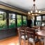 A dining room staged in Fremont neighborhood, Seattle, WA A big square dining table was the right choice for this Fremont Craftsman Style house.