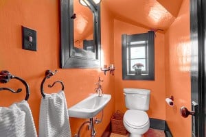 orange walls in the powder room