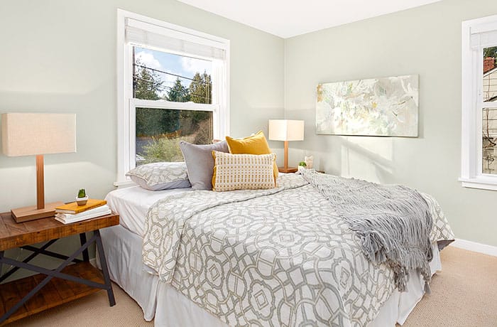 Seattle staged bedroom with mix patterns