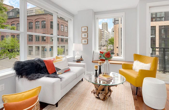 Seattle Condo with yellow color accent chair