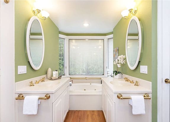 Green color master suite bathroom design