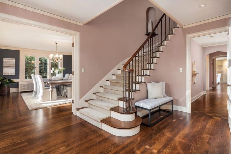 Highland Drive mansion entry with staircase