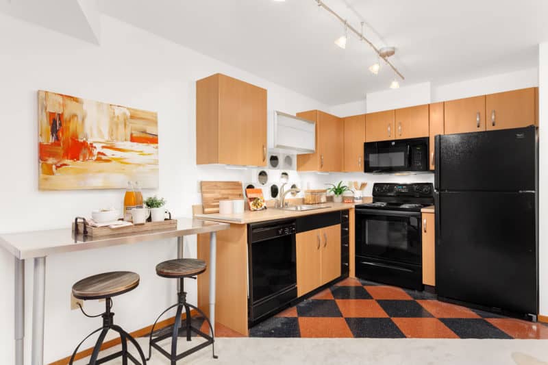 staged kitchen of aurora studio condo