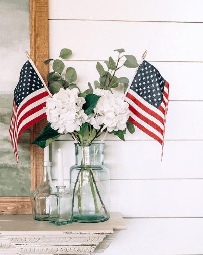 Fourth of July flags in vase