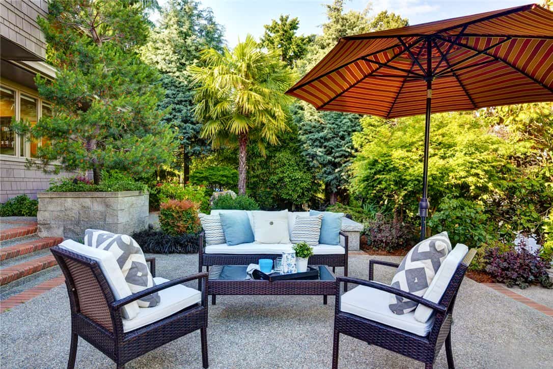 patio seating with blue and white cushions