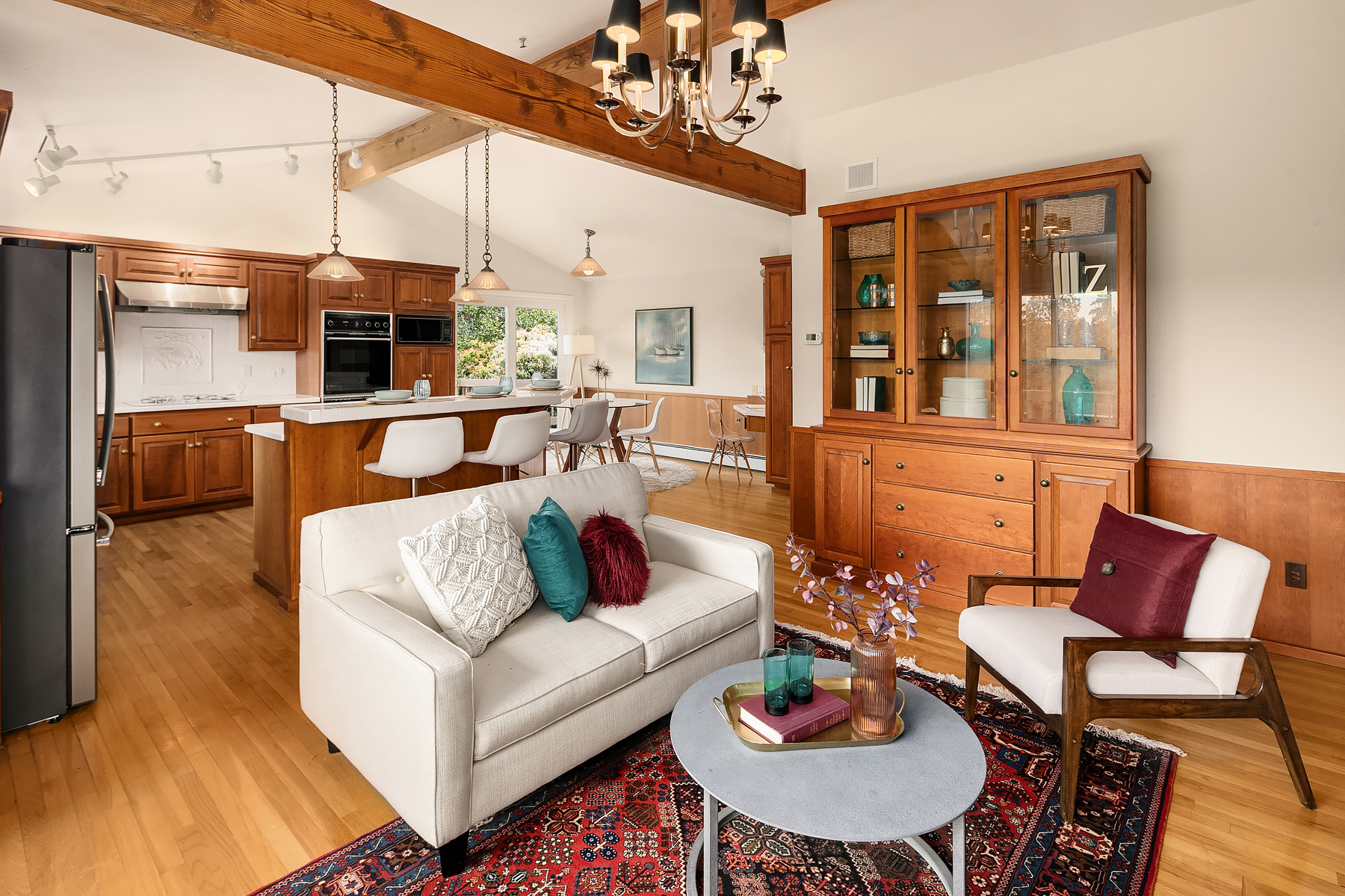 living room with teal and burgundy accent colors