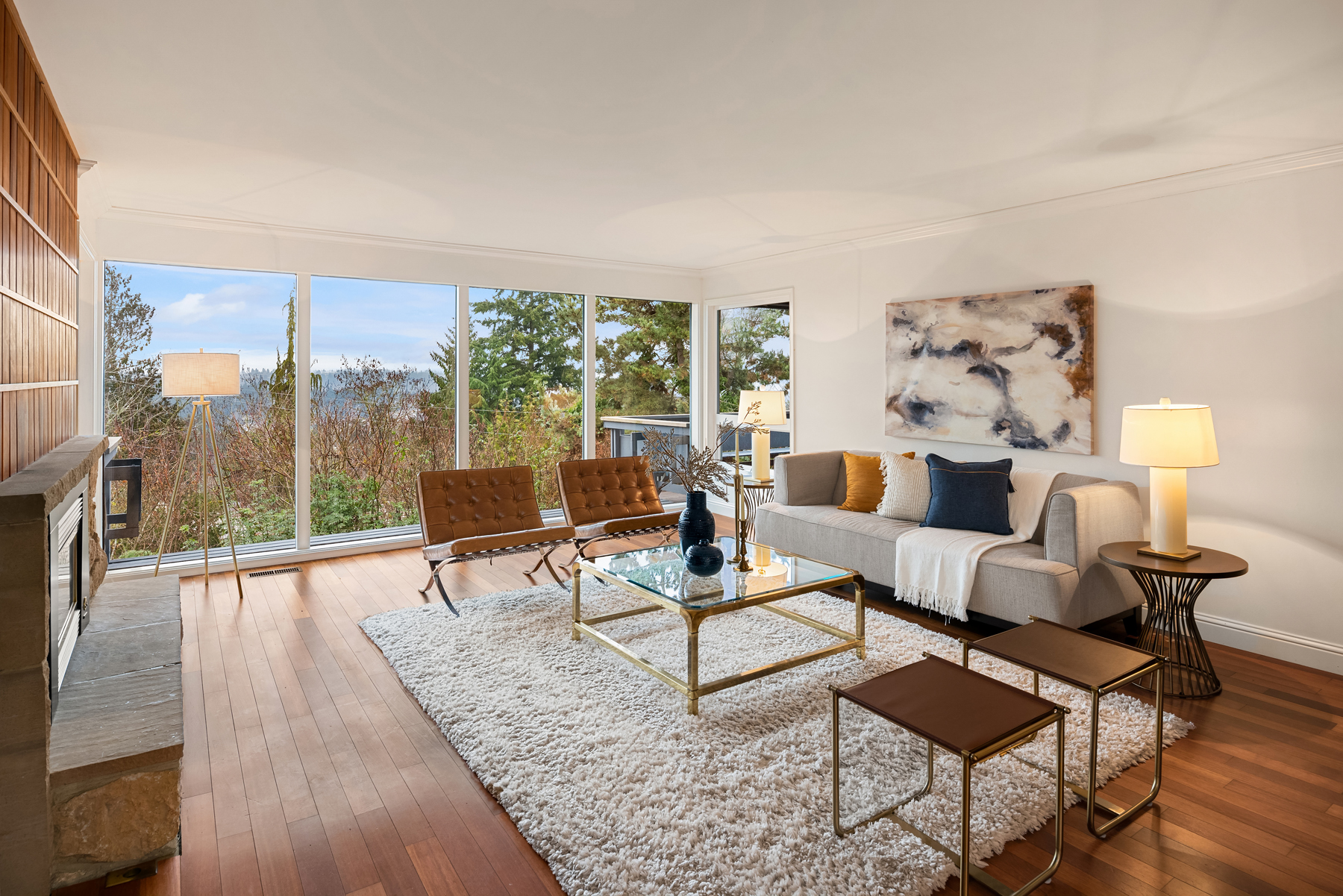 Staged living room with transitional and midcentury inspired decor 