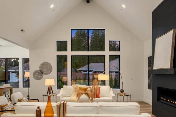 staged living room with orange accents