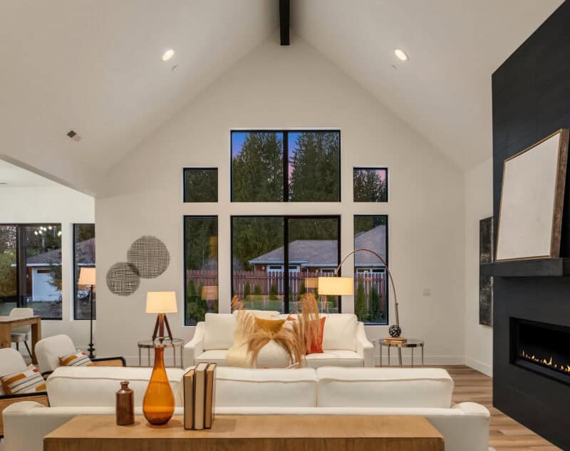 staged living room with orange accents