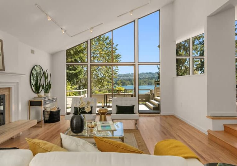 contemporary living room with large angled windows