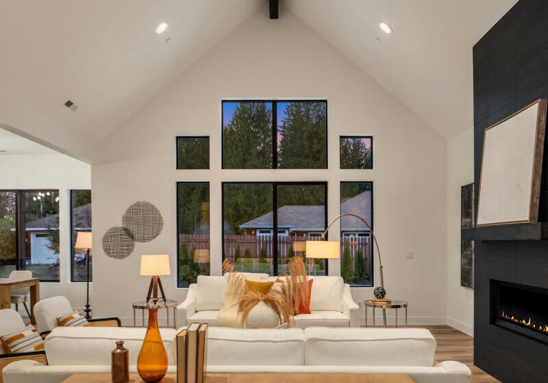 staged living room with orange accents